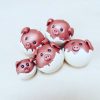 Pigs in blankets tree decor group shot mini piggy on left and 2 behind and 2 larger to the side_madebymecrafts
